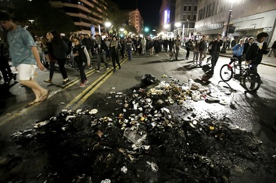 Anger Over Trump Explodes; Protesters Smash Glass, Chant 'That's Not My President'