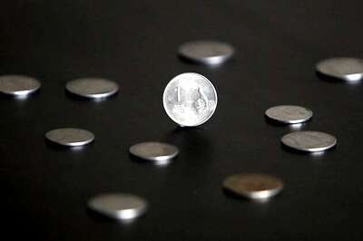 Rupee up 15 paise against dollar at 56.69