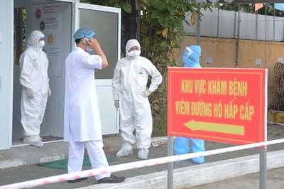 Vietnam says contagion 'under control' in virus epicentre but spread elsewhere