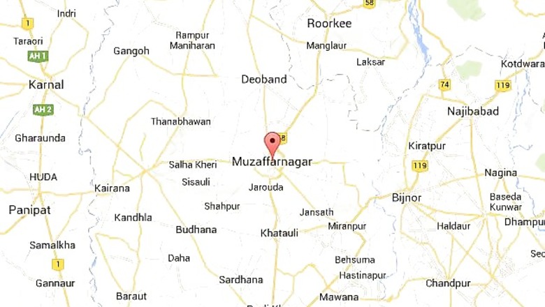 Man held for sitting in police officer's chair, donning cap