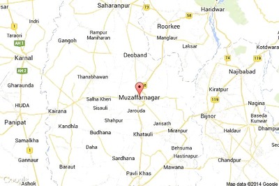 Man held for sitting in police officer's chair, donning cap