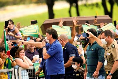Jair Bolsonaro Snaps Photos with Children at Brazil Protest, Defying Health Advice