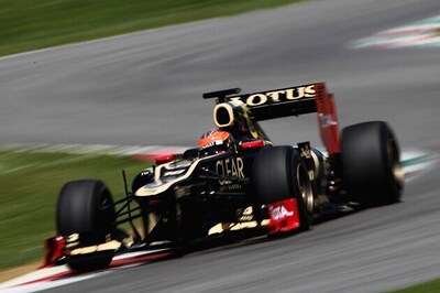 Consortium takes 35 percent stake in Lotus F1