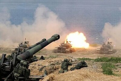 Taiwan to raise defence spending as China details combat drills