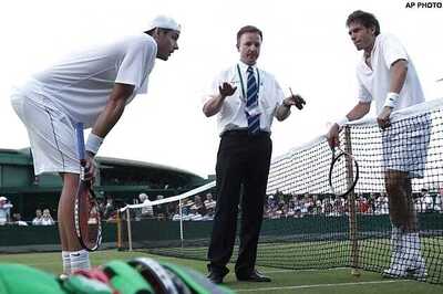 Wimbledon match: 10 hours and counting