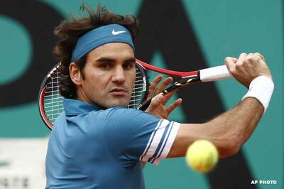 Federer through to set up re-match with Soderling