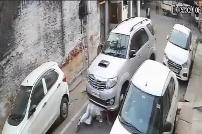 UP Man Runs Over Elderly Man Twice While Reversing SUV In Jhansi | Video