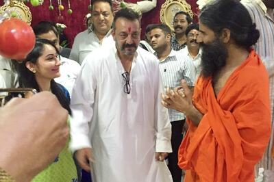 Snapshot: Sanjay Dutt and wife Manyata visit Mohit Kamboj's residence with Baba Ramdev for Ganpati Darshan