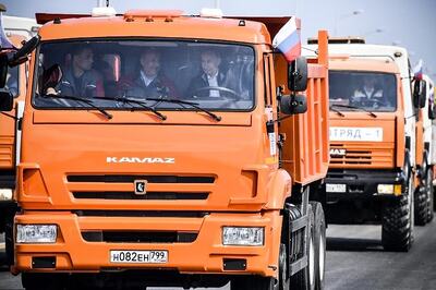 Russian President Vladimir Putin Drives Kamaz Truck to Crimea on New Bridge, Bikers Join the Drive