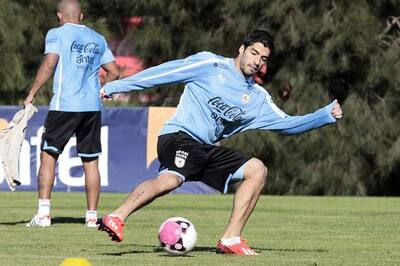 Liverpool confirm Arsenal's bid for Suarez