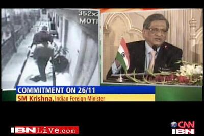 Qureshi hails PM, Krishna meets Zardari