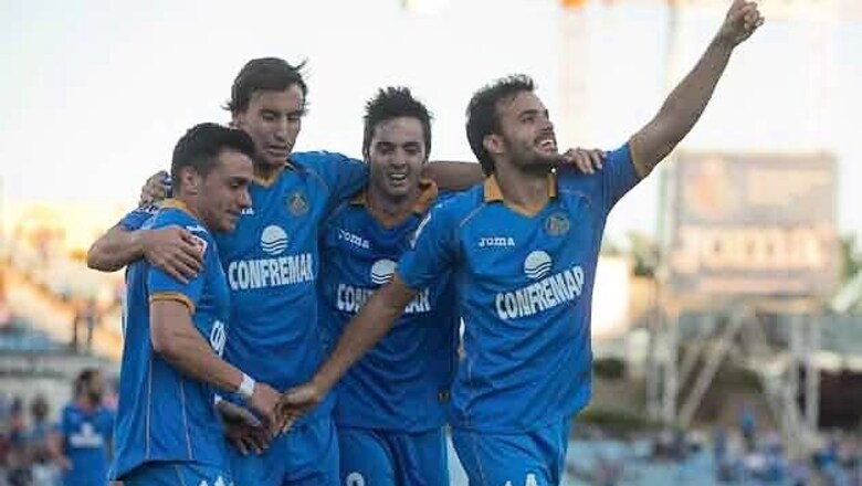 Getafe beat 10-man Granada for fourth straight win
