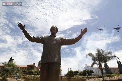 Day after burial, South Africa unveils Nelson Mandela 'unity' statue
