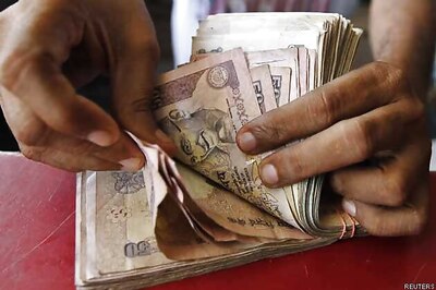 Rupee opens lower at 61.37 vs dollar
