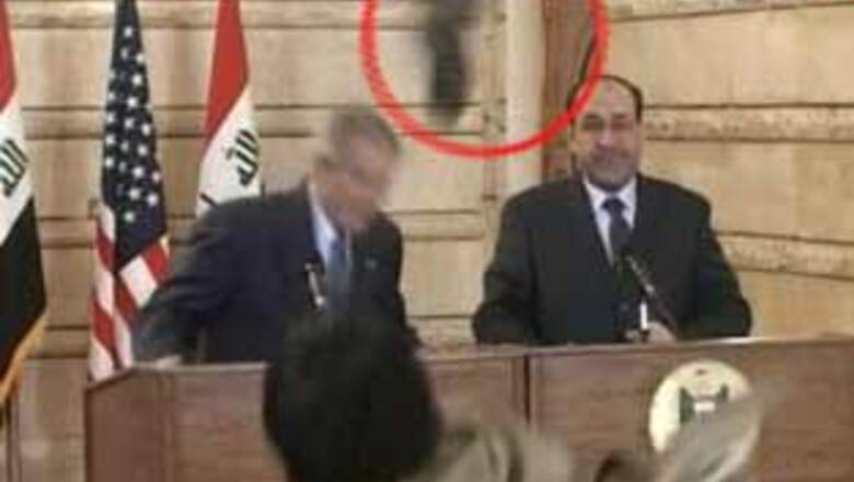 Baghdad holds rally for the bush show thrower