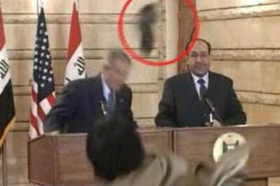 Baghdad holds rally for the bush show thrower