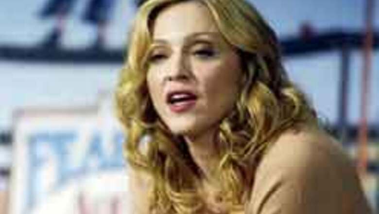 Madonna slams husband for being timid
