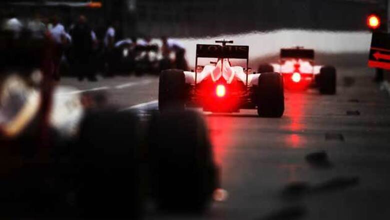 Raikkonen and Ricciardo demoted for pit lane error
