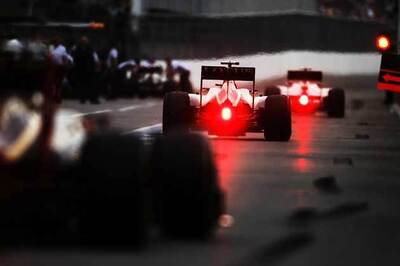 Raikkonen and Ricciardo demoted for pit lane error