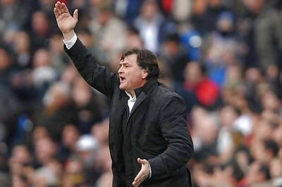 China in talks with national coach to end contract