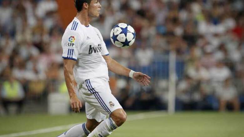 Ronaldo nets four to fire Madrid on top