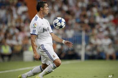 Ronaldo nets four to fire Madrid on top