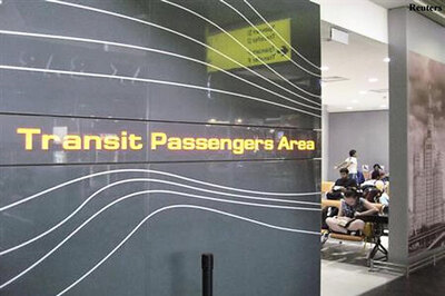 Snowden drops Russia asylum request, in transit area, says Kremlin