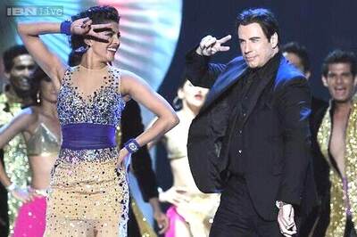 John Travolta, Kevin Spacey perform Bollywood dance steps at IIFA 2014