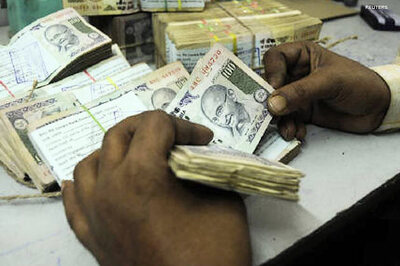 Rupee rises by 12 paise against dollar