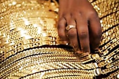 Gold hits record above $910; platinum, silver surge