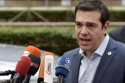 Reluctant Tsipras fights to pass reforms in Greek parliament