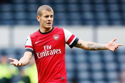 Wilshere , Podolski doubts for Arsenal's game at Bayern