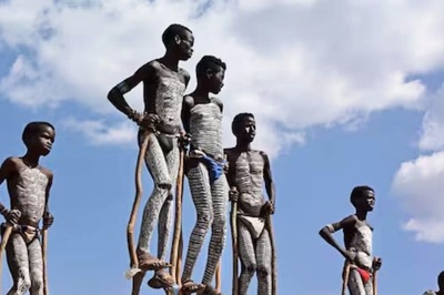 Why This African Tribe Prefers Walking On 10-foot-high Sticks