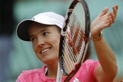 Henin sets up title clash with Ivanovic