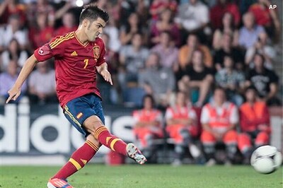 Villa boost for Spain as favourites begin defence