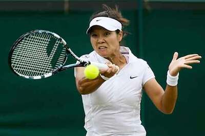 Li Na crushes Vinci to reach Wimbledon quarter-finals