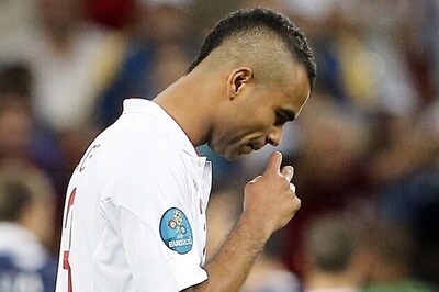 UK Police investigate racial tweets against Cole, Young