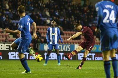 Milner stunner seals win for Man City against Wigan