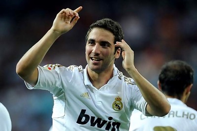 Podolski happy Arsenal going for Higuain