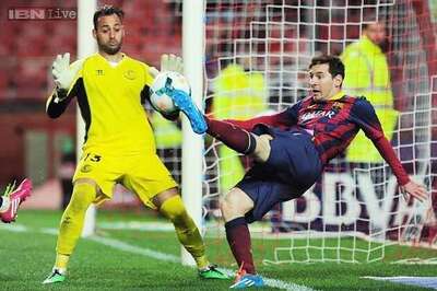 Lionel Messi nets twice as Barcelona defeat Sevilla 4-1