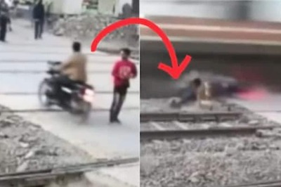 Watch: Biker Narrowly Escapes Death At Railway Crossing