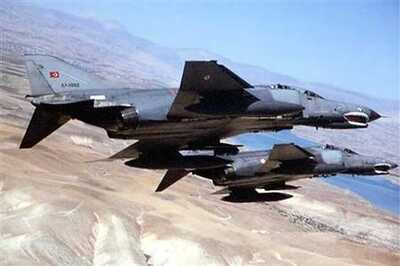 Turkey blames Syria for jet attack, consults NATO