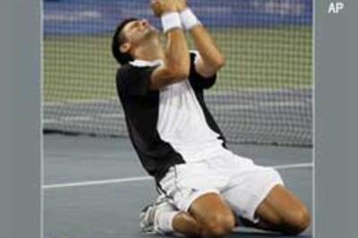 Djokovic shrugs off ankle injury to reach Rd 2
