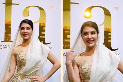 Jacqueline Fernandez Joins the Hooded Trend in an Ivory and Gold Ensemble