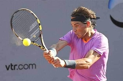 Nadal overcomes slow start to advance in Chile