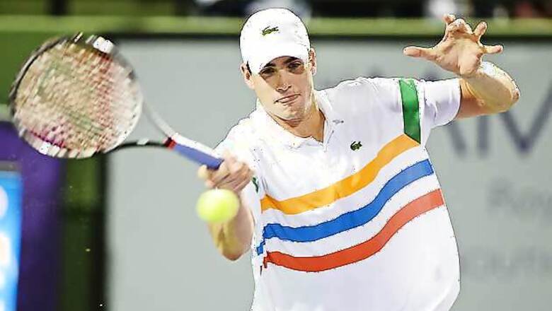 Marathon man John Isner gets quick Wimbledon win