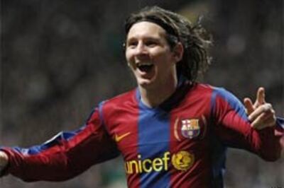 Messi caught spitting at rival