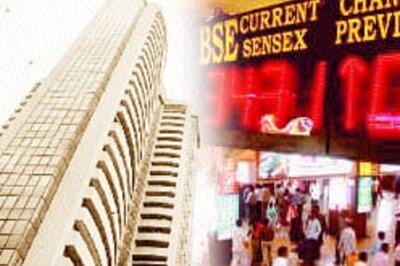 Mkts in action: Sensex closes above 12K