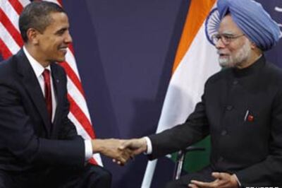 In pics: Obama, Manmohan get friendly at G20