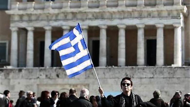 Greece narrowly passes crucial austerity bill